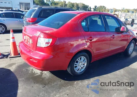 2013 Suzuki Sx4 Le/Le Popular z USA, uszkodzony, nr VIN JS2YC5A36D6100855